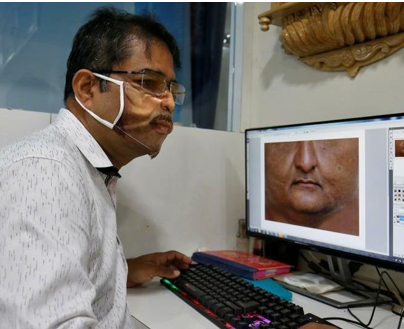印度照相馆推出人脸口罩